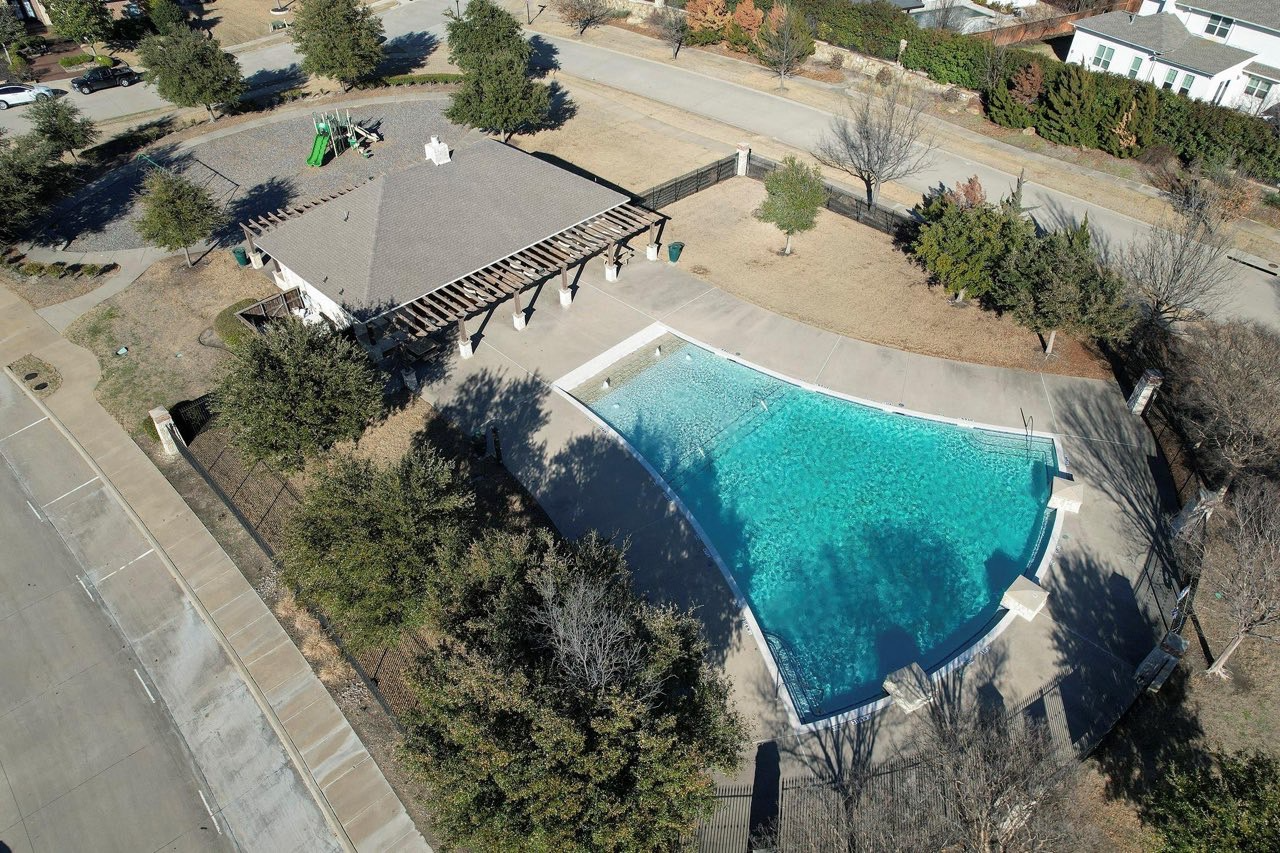 Saddleridge community pool and pergola — aerial view